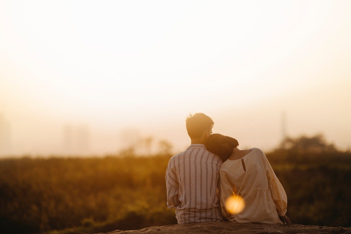 Couple relaxing in a sunset